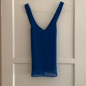 Open-back, never worn, blue tank!